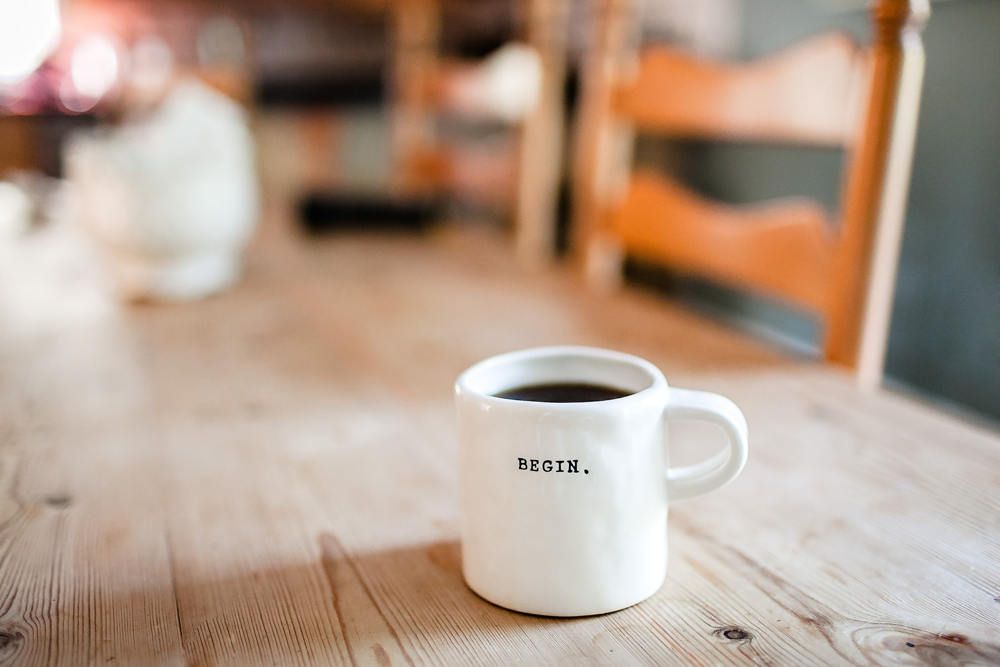 danielle-macinnes-IuLgi9PWETU-unsplash change career + begin mug
